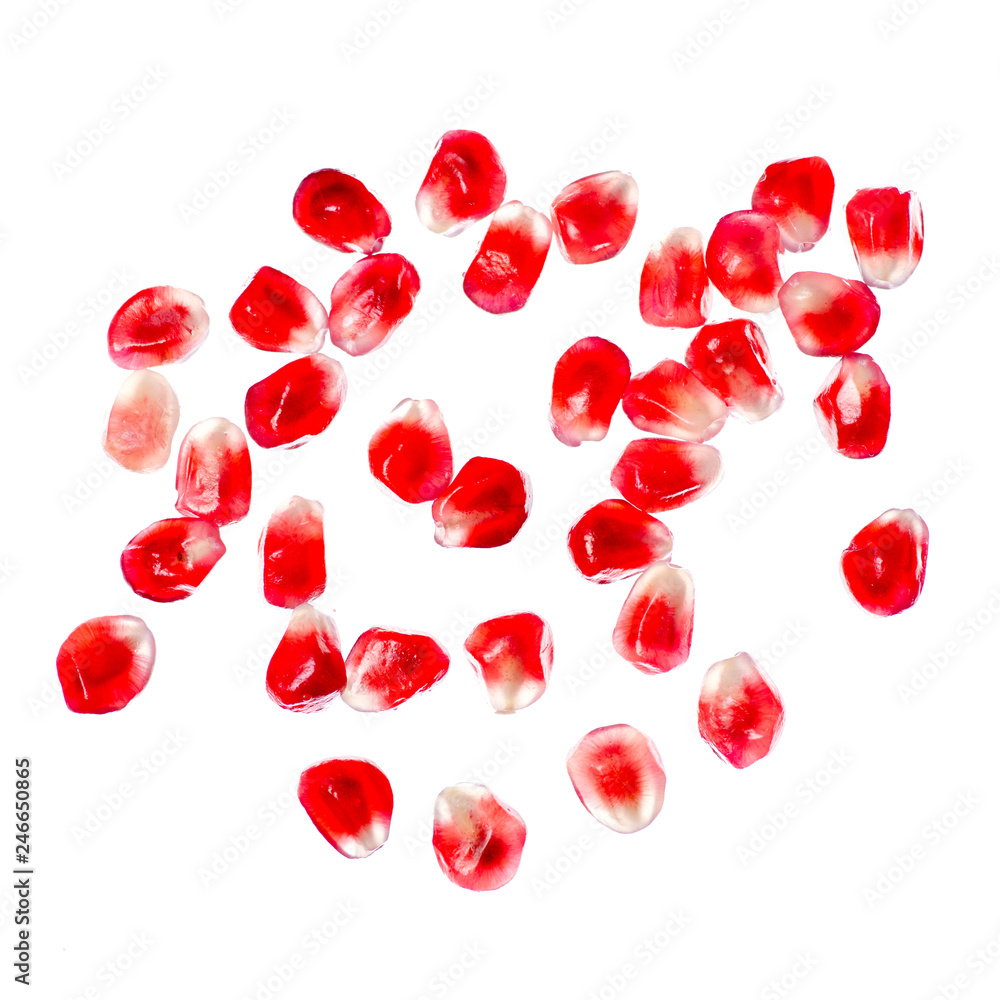 pomegranate fruit macro on white background isolation, top view pomegranate fruit macro on white background isolation, top view