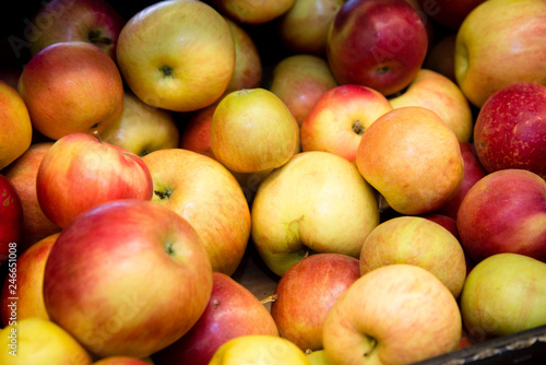 ripe red apples on the counter in the supermarket