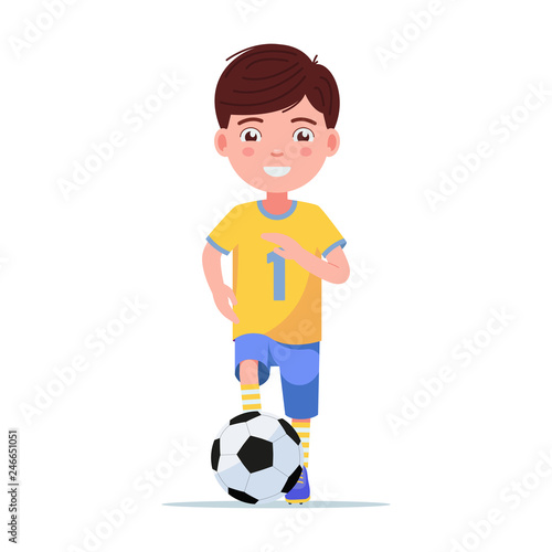 Boy football player in sportswear runs with ball