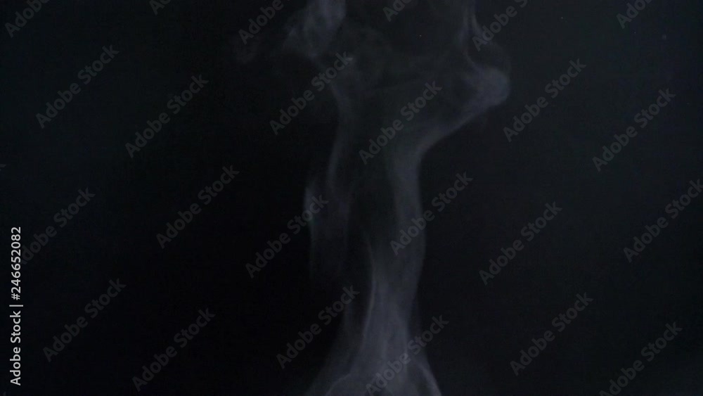 Closeup shot of fade vapouring smoke slowly flying on black background. Closeup shot of fade vapouring smoke slowly flying on black background.