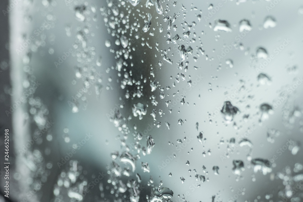 Many small drops of water on the car window Many small drops of water on the car window