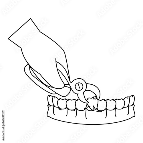 dentist extracting tooth with pliers