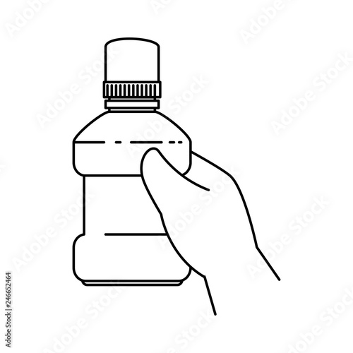 hand with mouth wash bottle