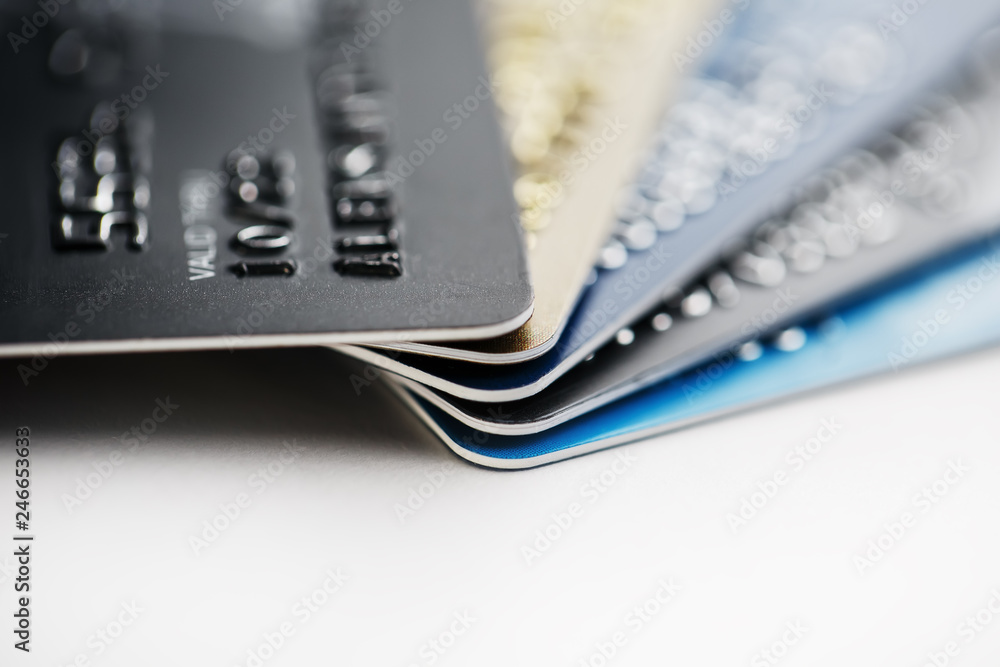 Credit card payment with close up shot isolated on white background,selective focus. Credit card payment with close up shot isolated on white background,selective focus.