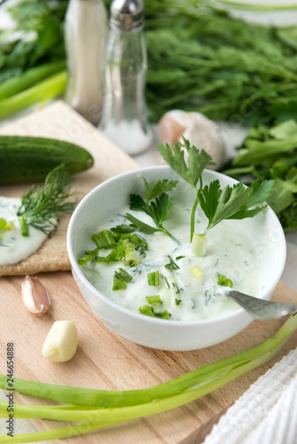 Greek yogurt with herbs, garlic and cucumber, Greek salad,