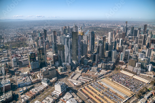 MELBOURNE - SEPTEMBER 8  2018  Aerial view of city skyline and car parking from helicopter. Melbourne attracts 15 million people annually