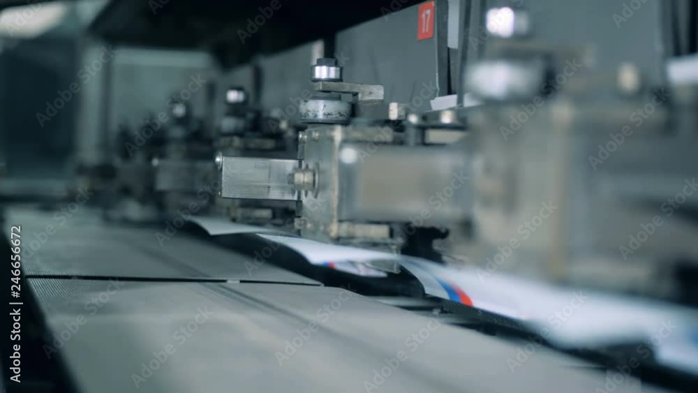 Factory mechanism with paper covers is moving slowly Factory mechanism with paper covers is moving slowly