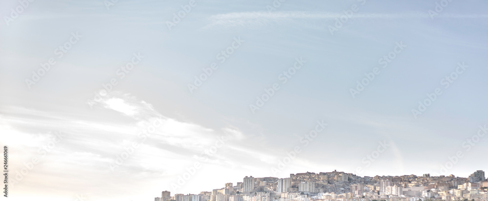 landscape in italy with mountains and city and blue sky landscape in italy with mountains and city and blue sky