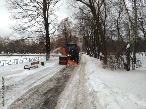 snow removal with a tractor, cleaning the tracks