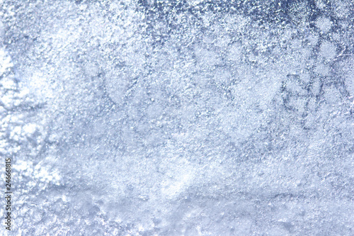 Whimsical macro abstract art background of frozen water condensation on a glass window in winter 