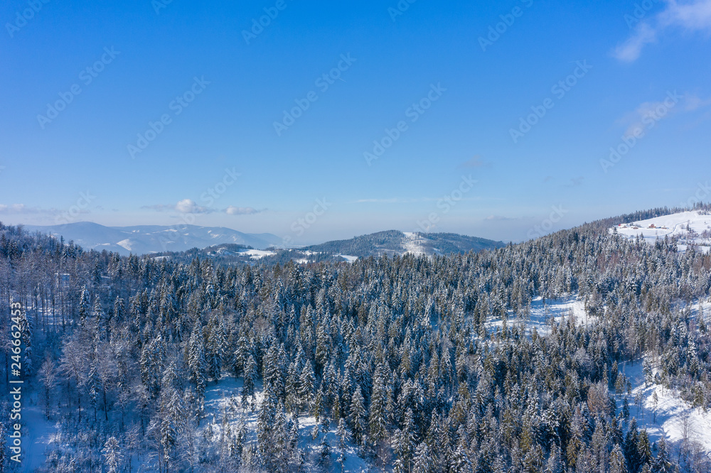 Winter scenery in Silesian Beskids mountains. View from above. Landscape photo captured with drone. Poland, Europe. Winter scenery in Silesian Beskids mountains. View from above. Landscape photo captured with drone. Poland, Europe.