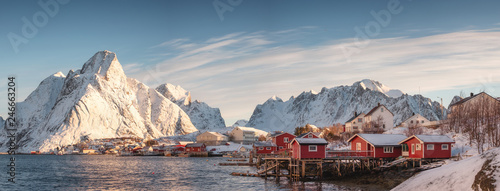 Scandinavian village with snow mountain at coastline in morning © Mumemories