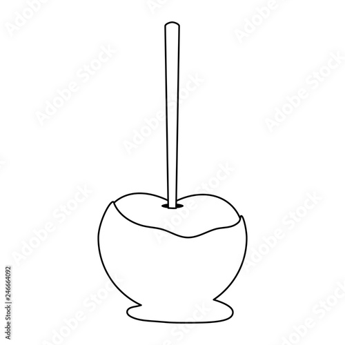 caramelized apple with stick in black and white