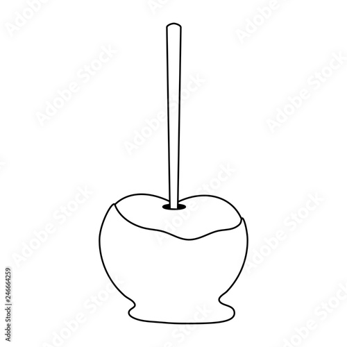 caramelized apple with stick in black and white