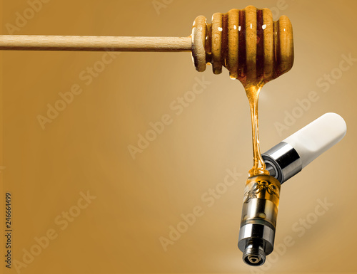 Honey dripping into cartridge