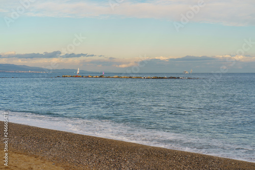 Calm sunset at the Barcelona city beach photo