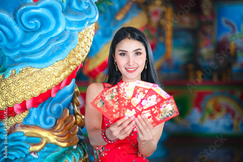 beauty woman and hold shopping bags in chinese new year