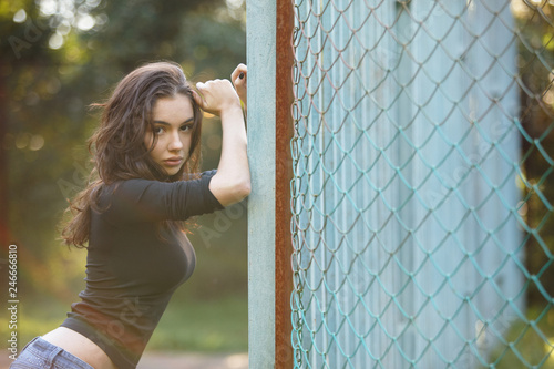 Amazing and beautiful girl posing at the park