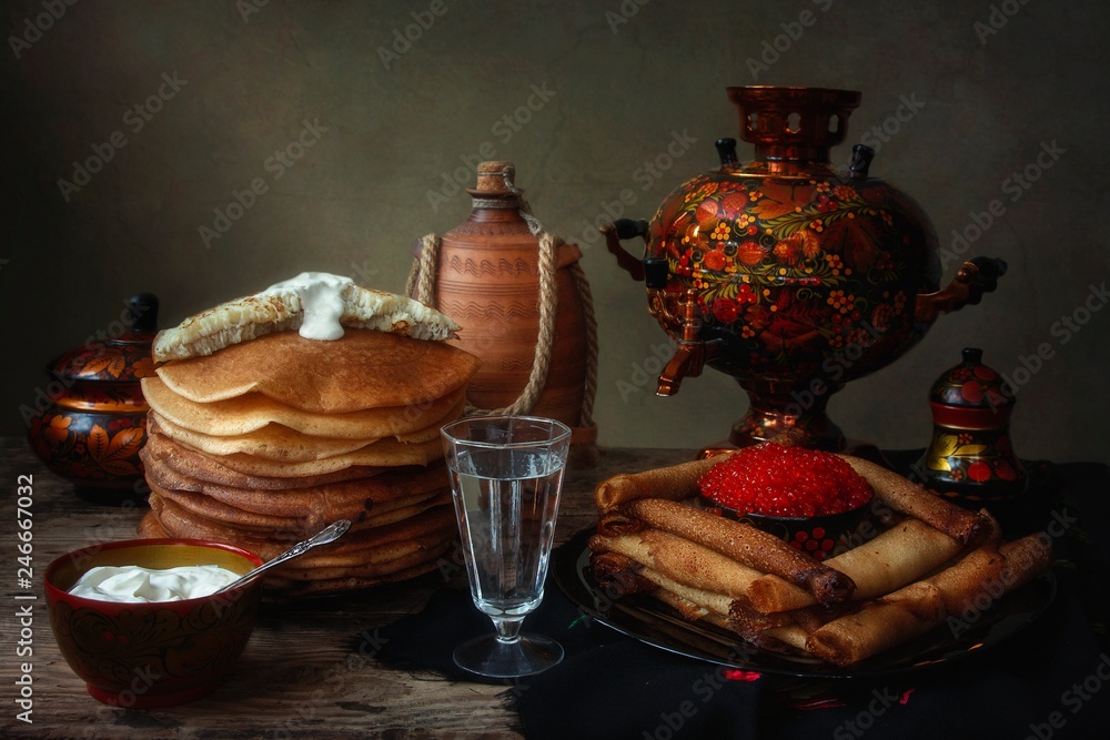 Still life with pancakes and samovar