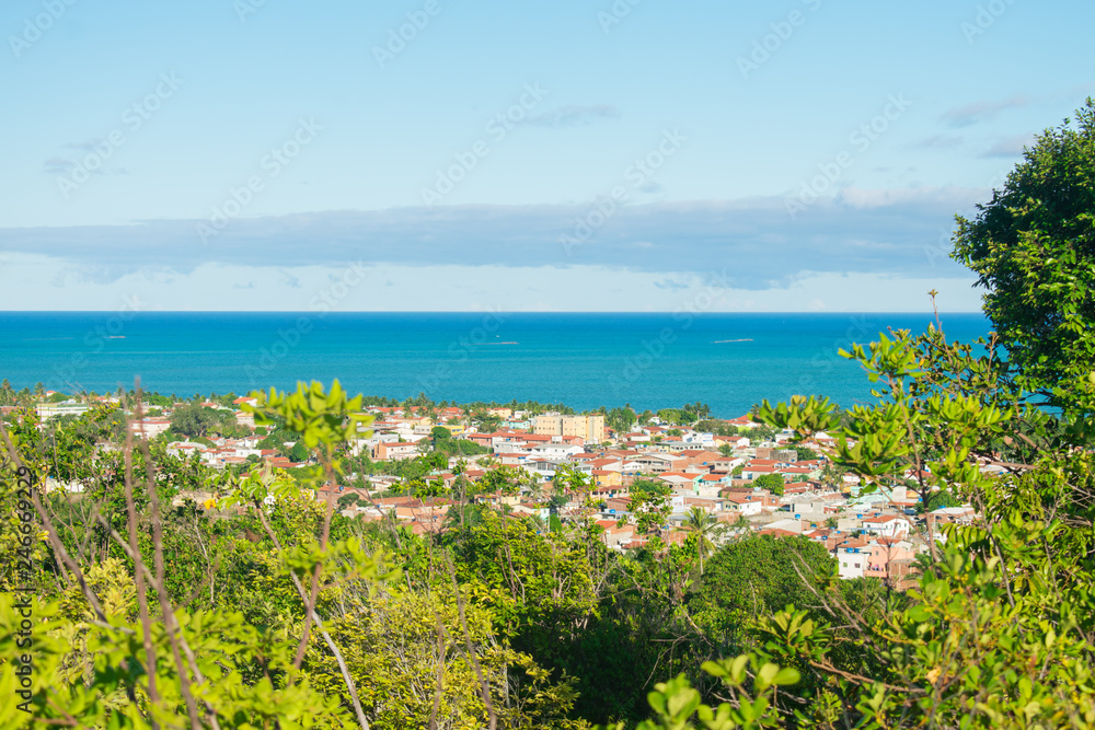 A view of Itamaraca island from a hill - Pilar neighborhood and atlantic ocean in the background (Ilha de Itamaraca, Brazil)
