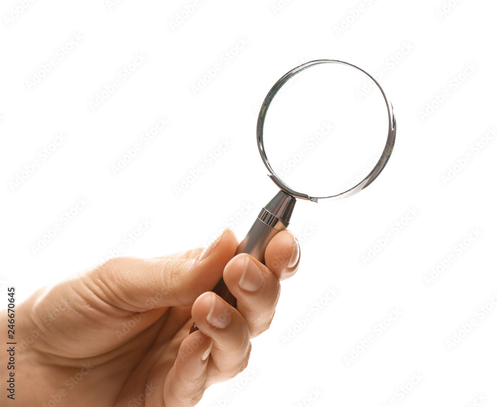 Woman holding magnifying glass on white background, closeup Woman holding magnifying glass on white background, closeup