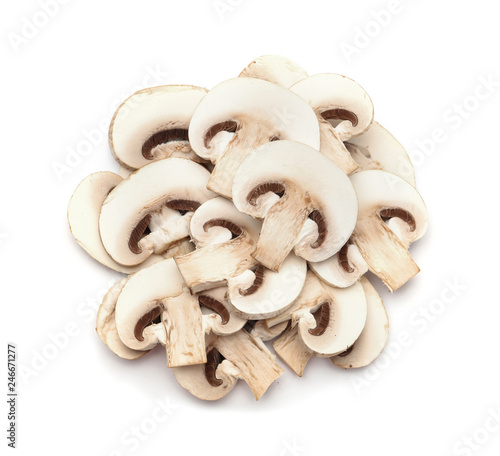Slices of fresh champignon mushrooms on white background, top view