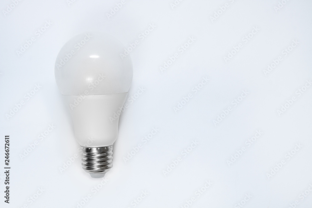 Light bulb on a gray background. Light bulb on a gray background.