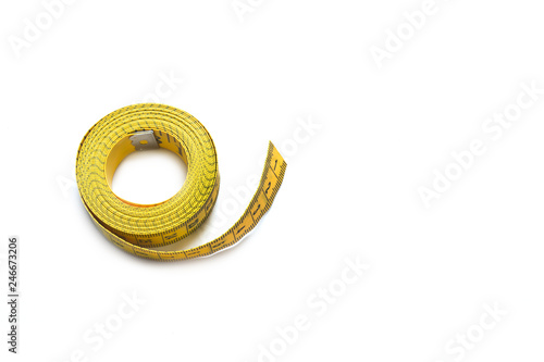 Yellow centimeter isolated on white background. View from above
