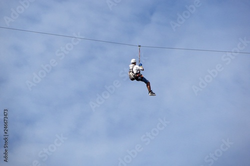Boy on the rope in the sky
