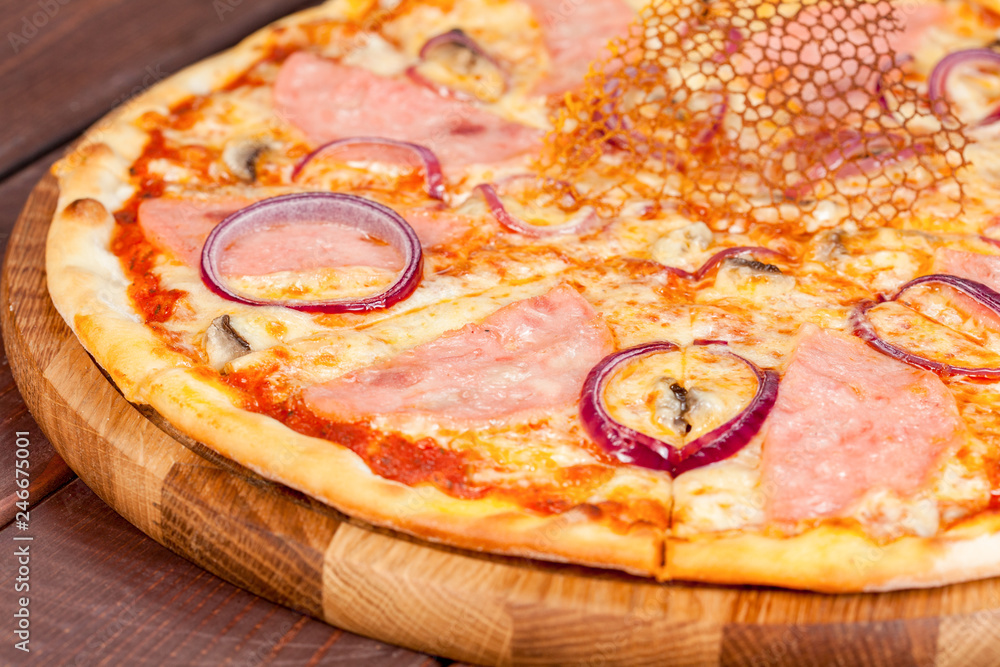 appetizing, fresh pizza on the table, for a design decoration in cooking appetizing, fresh pizza on the table, for a design decoration in cooking