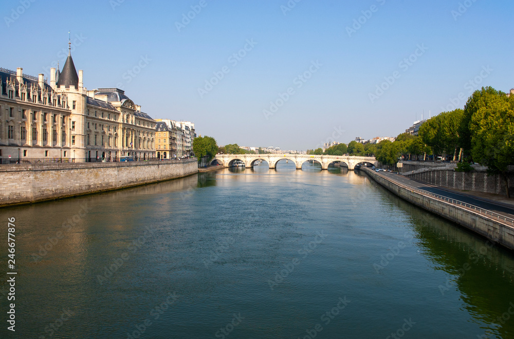 View to Seine river, New Bridge (Pont Neuf) and Conciergerie (former royal palace and former prison), Paris, France
