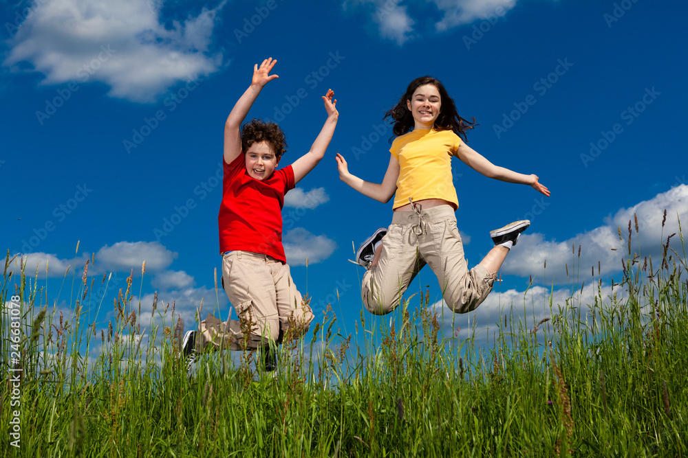 Girl and boy running, jumping outdoor Girl and boy running, jumping outdoor