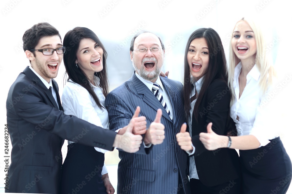 closeup head and business team showing thumb up. closeup head and business team showing thumb up.