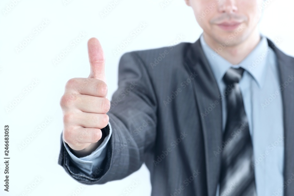 closeup.young business men showing thumb up. photo with copy space closeup.young business men showing thumb up. photo with copy space