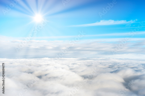 Blue sky and white clouds with sun rays © Pavlo Vakhrushev