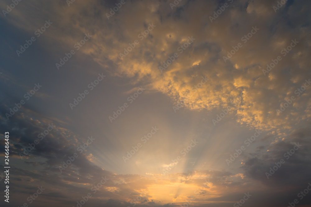 Sunset. Evening light with golden clouds and blue sky in Lithuania. Abstract background Sunset. Evening light with golden clouds and blue sky in Lithuania. Abstract background