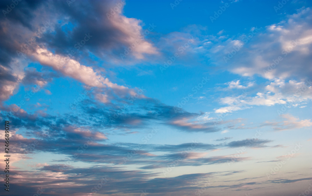 Obraz premium Beautiful blue sky with white clouds.