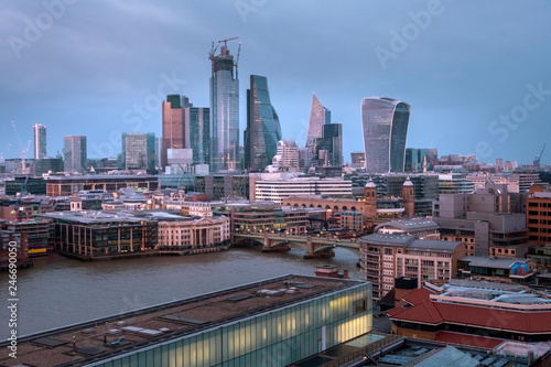 Panoramic view of London skyscrapers in the financial district in the evening, after sunset