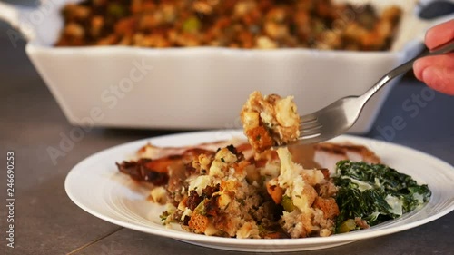 Fork takes stuffing off plate