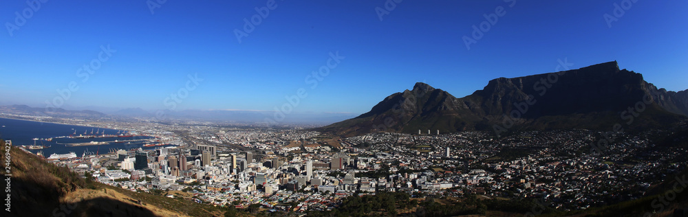 A Panorama of Cape Town and Table Mount on a sunny day as seen from Lions Tail, South Africa.