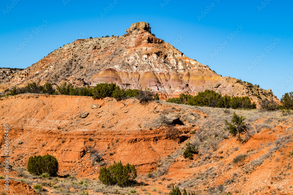 Rock formations and natural geologic layering at Palo Duro Canyon State Park near Amarillo, Texas Rock formations and natural geologic layering at Palo Duro Canyon State Park near Amarillo, Texas