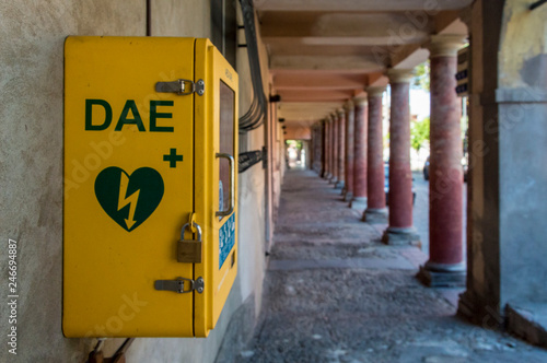 Meldola, Italy, close up of an automated external defibrillator (in italian abbreviation is DAE) place on public street