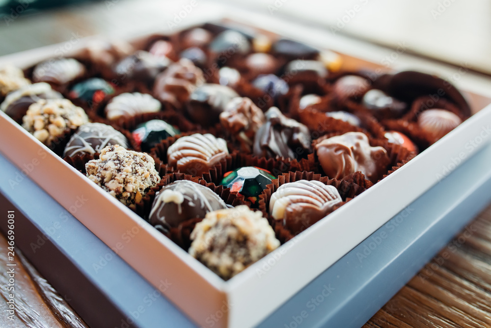 Handmade chocolates or candies in the box. This sweet chocolate gift are delicious, natural, organic luxury and healthy. Handmade chocolates or candies in the box. This sweet chocolate gift are delicious, natural, organic luxury and healthy.