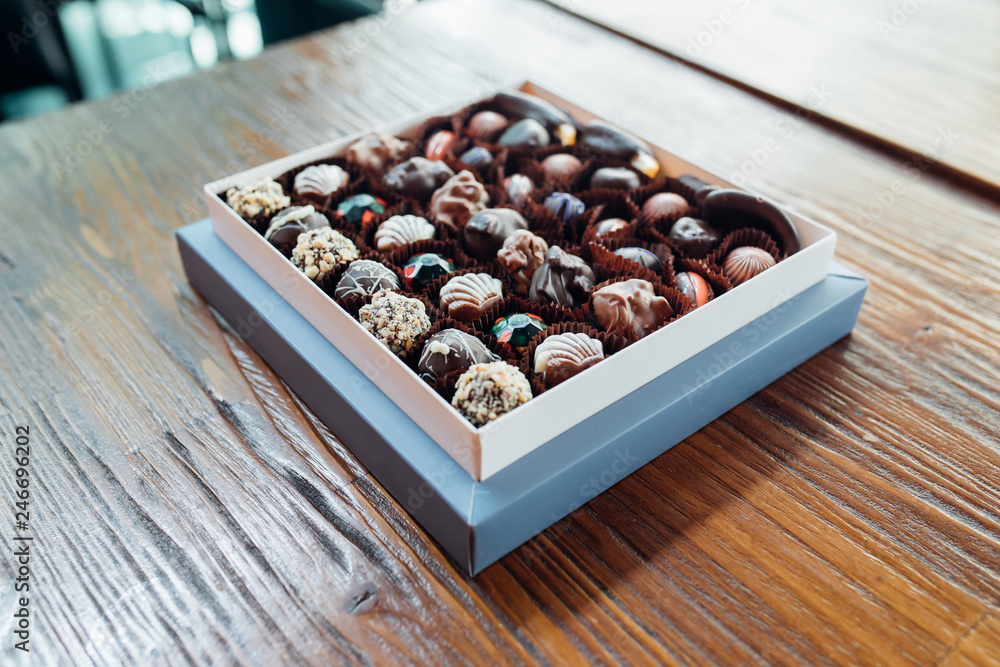 Handmade chocolates or candies in the box. This sweet chocolate gift are delicious, natural, organic luxury and healthy. Handmade chocolates or candies in the box. This sweet chocolate gift are delicious, natural, organic luxury and healthy.