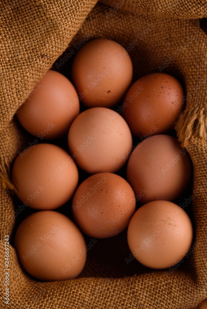 Fresh chicken eggs in burlap. Hen. egg. Easter. Fresh chicken eggs in burlap. Hen. egg. Easter.