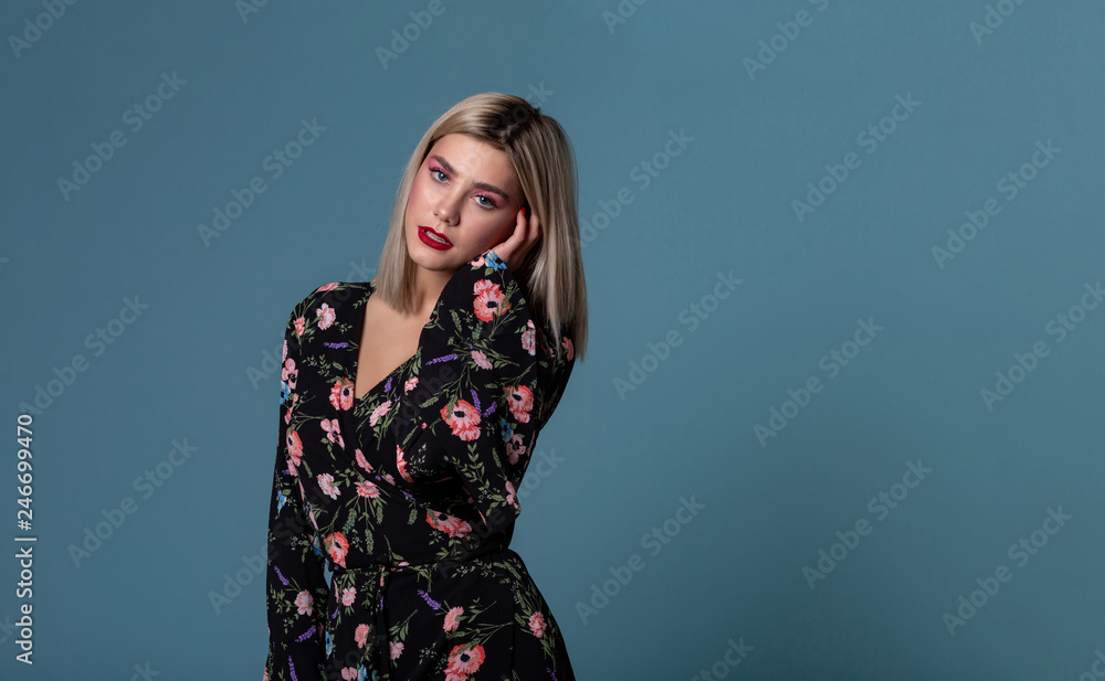 Fototapeta premium Cute lovely young blonde woman in summer dress