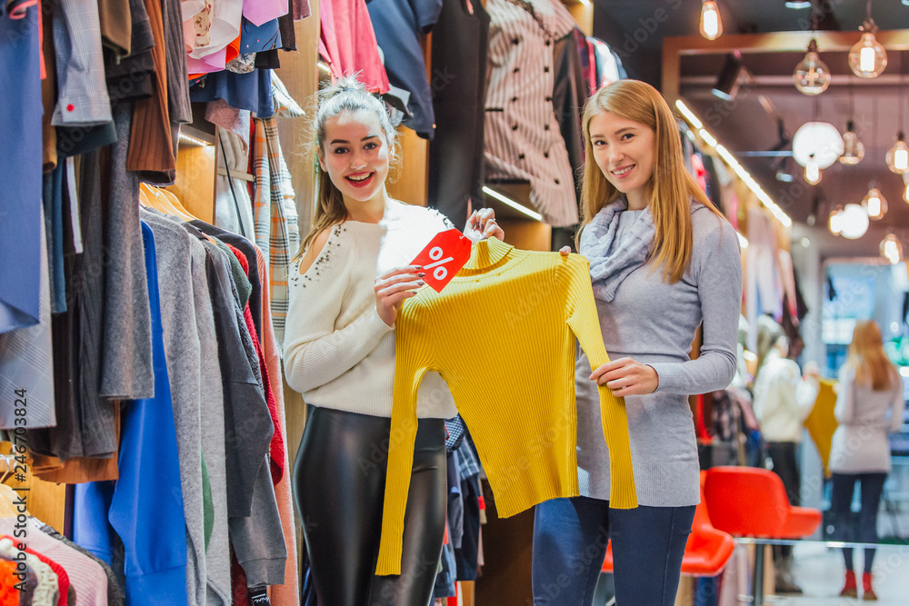 Young girls have captured things they found in the store.