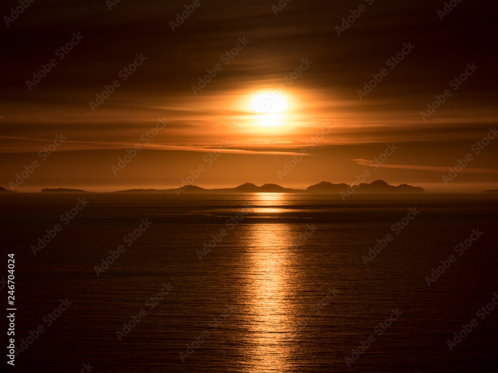 beautiful sundown above an island in the atlantic ocean beautiful sundown above an island in the atlantic ocean