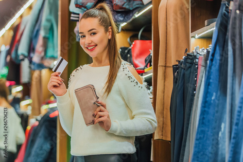 Young girl in the store. Feel good, smiling and laughing.