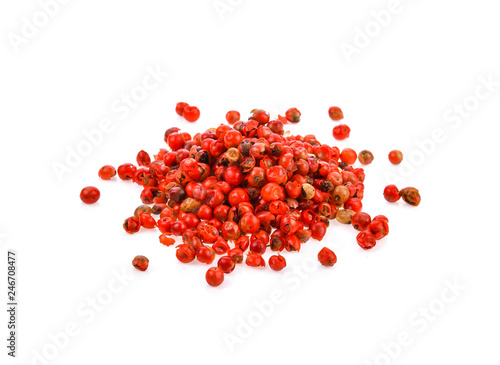 dried pink peppers isolated on white background